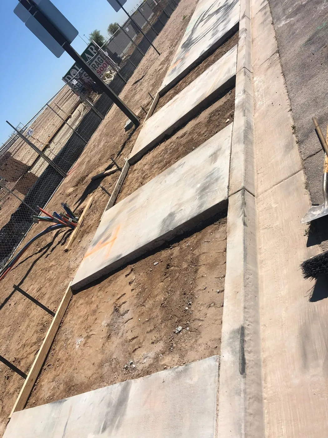 Walkway under construction with the adjacent grade still open