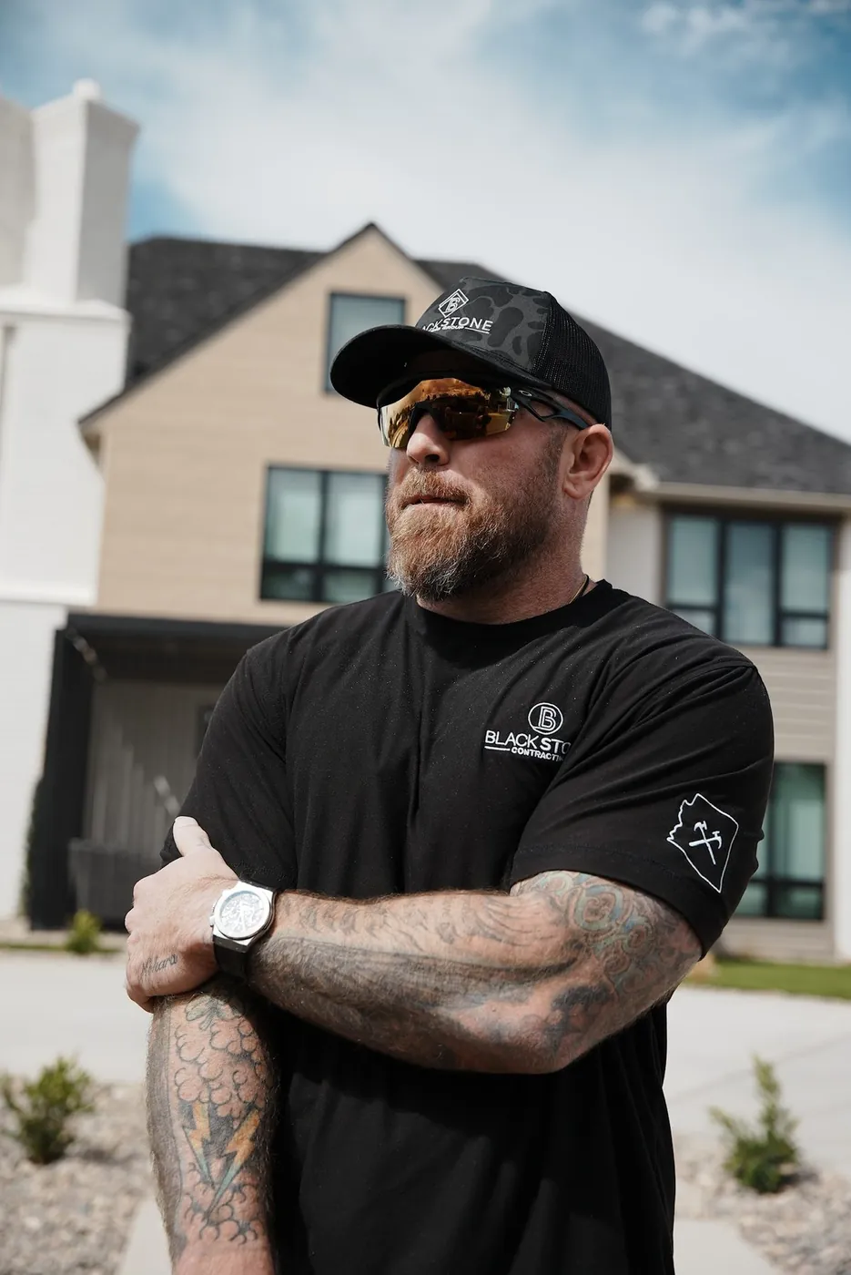 Blackstone Contracting team member outside a finished build